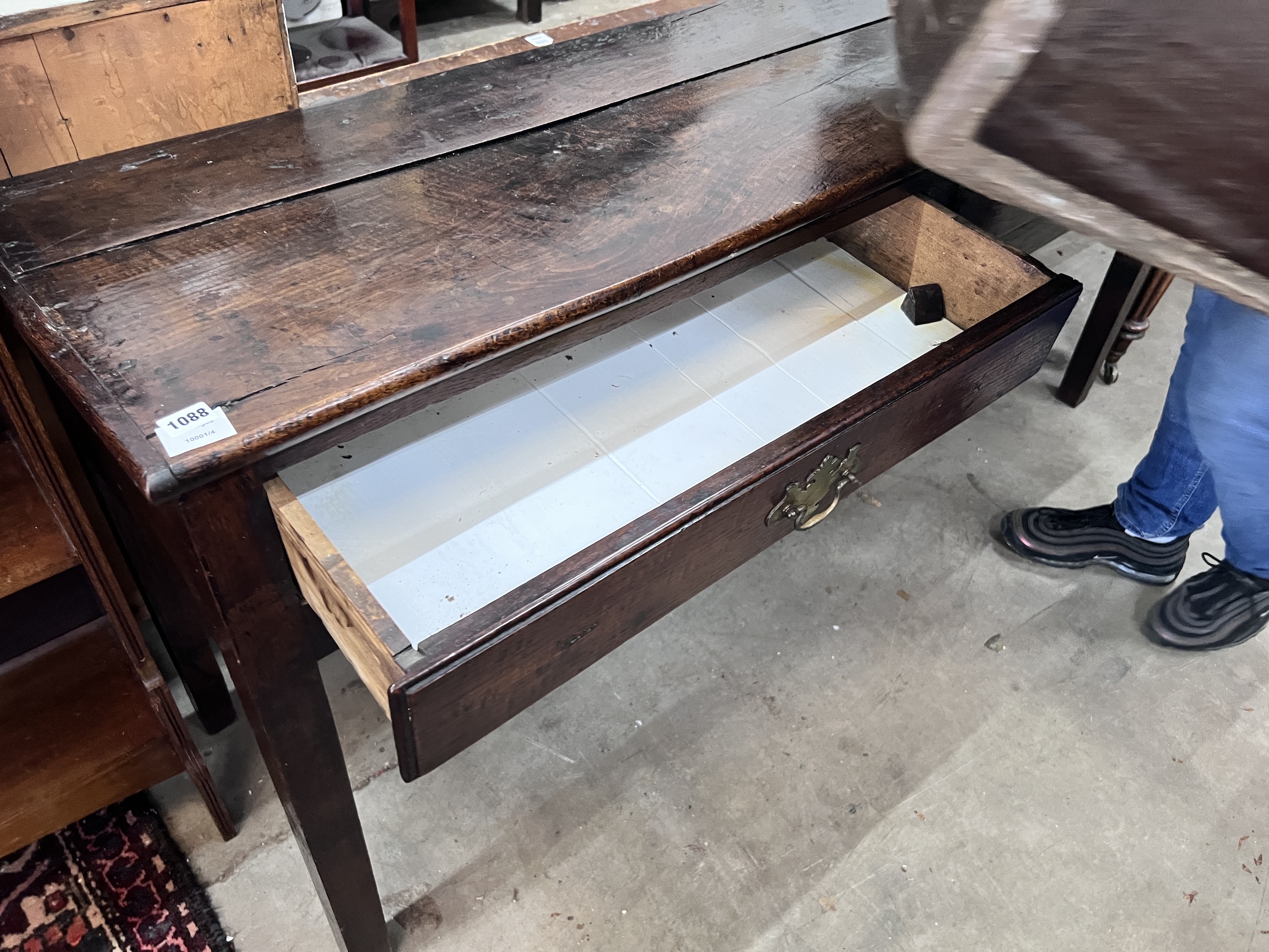 An 18th century oak low dresser, fitted two drawers, width 168cm, depth 45cm, height 78cm